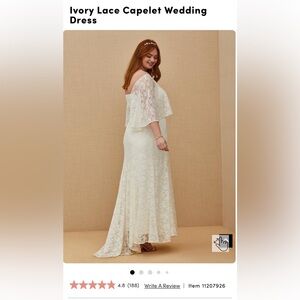 Torrid Ivory Lace Capelet Wedding Gown